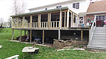 The room addition was built on the second story with the windows overlooking a great yard.